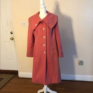Modern pink Coat I purchased from my travels to Europe.I usually wear size 10-12
